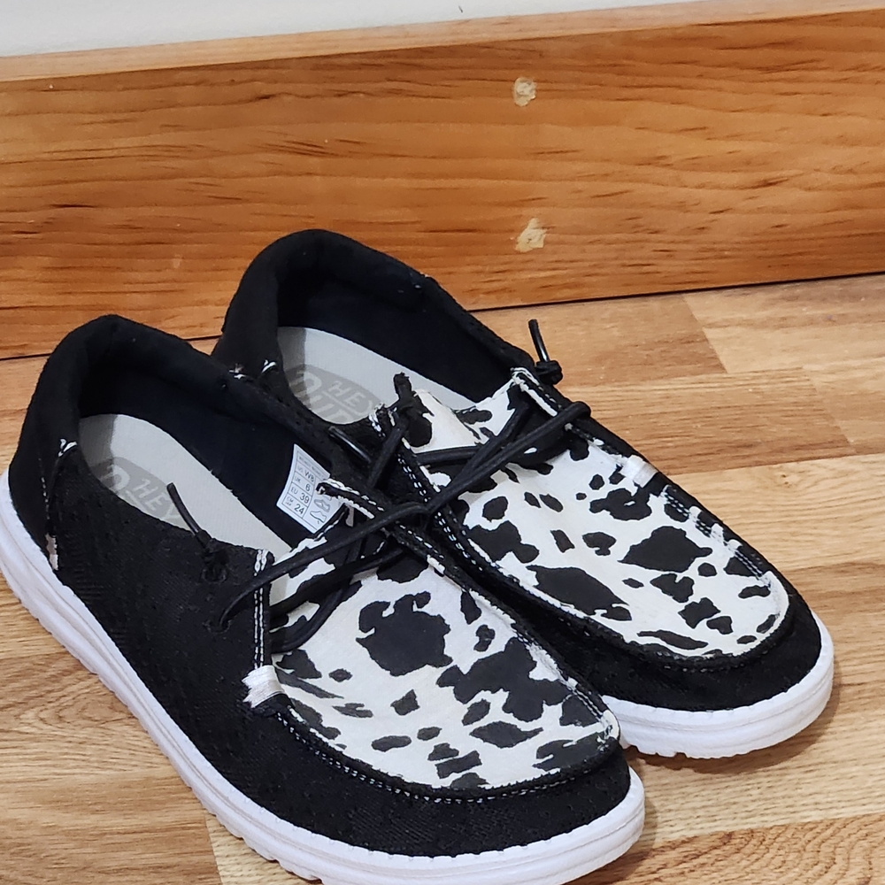 Hey Dude Women's Black and White Cow Print Shoes 8